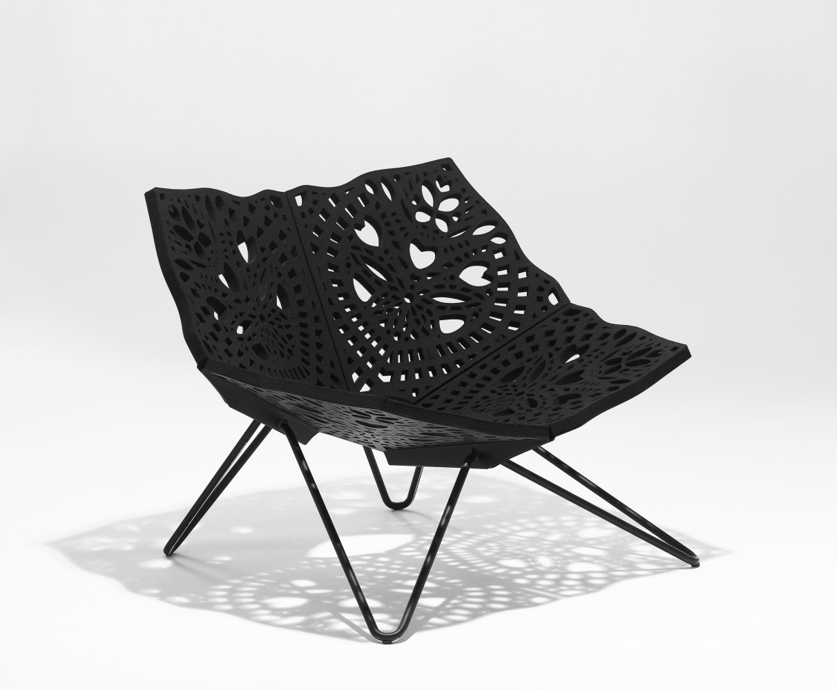 aser-cut steel and rubber chair resembling lace