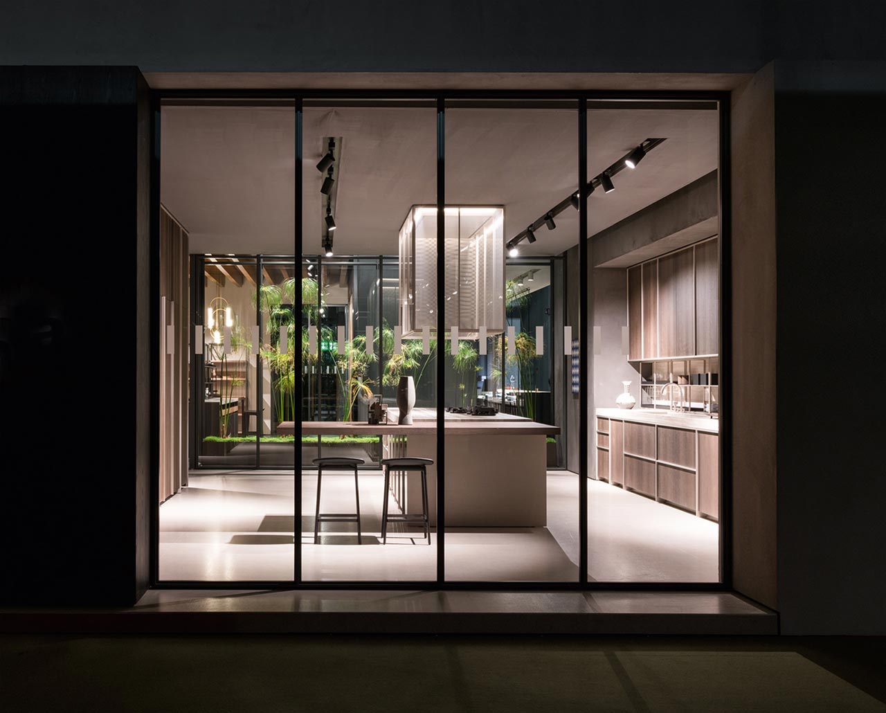 Dada showroom at EuroCucina 2018 showing a designer kitchen through a linear window