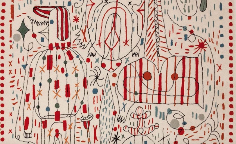 detail of wool area rug with hand-drawn modern designs