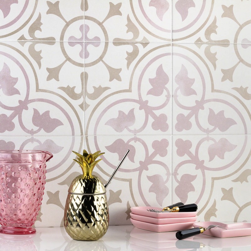 pink and white tile wall with floral motif