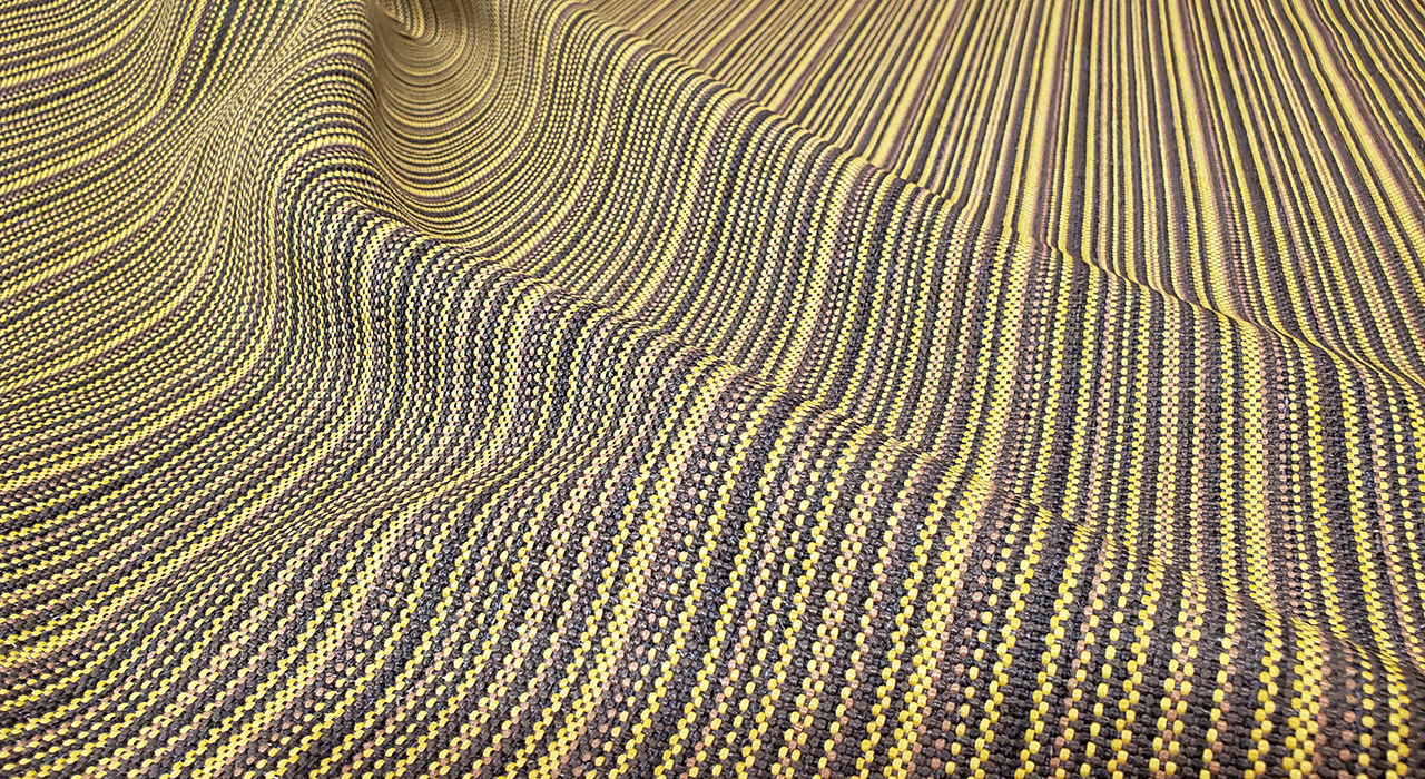 close-up view of gray and yellow upholstery textile
