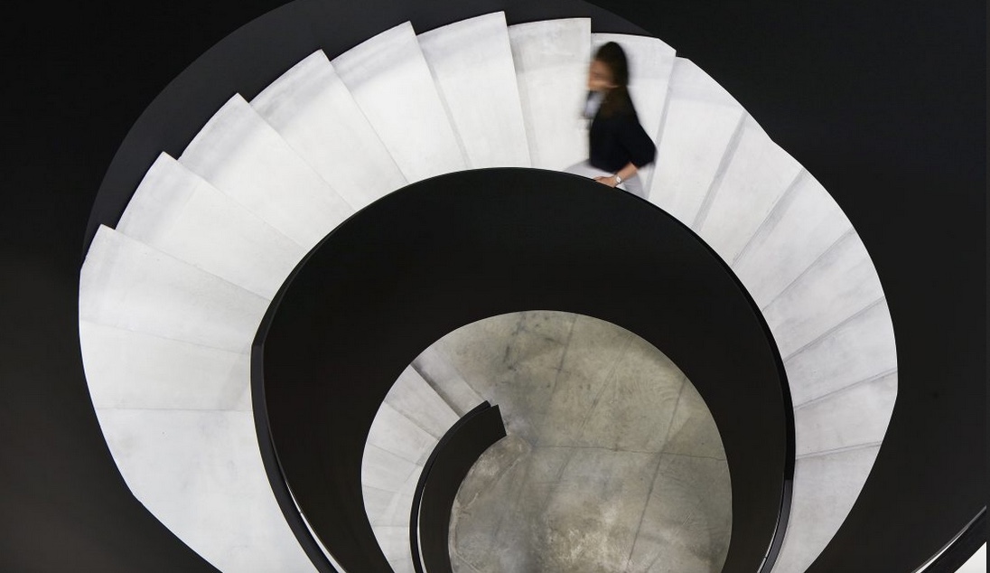 view of white and black circular staircase