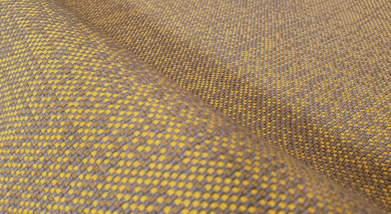 detail view of gray and yellow upholstery fabric