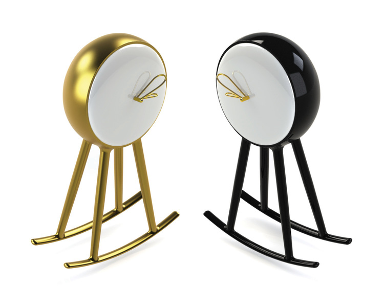 gold and black clocks with rocking horse base and loop hands
