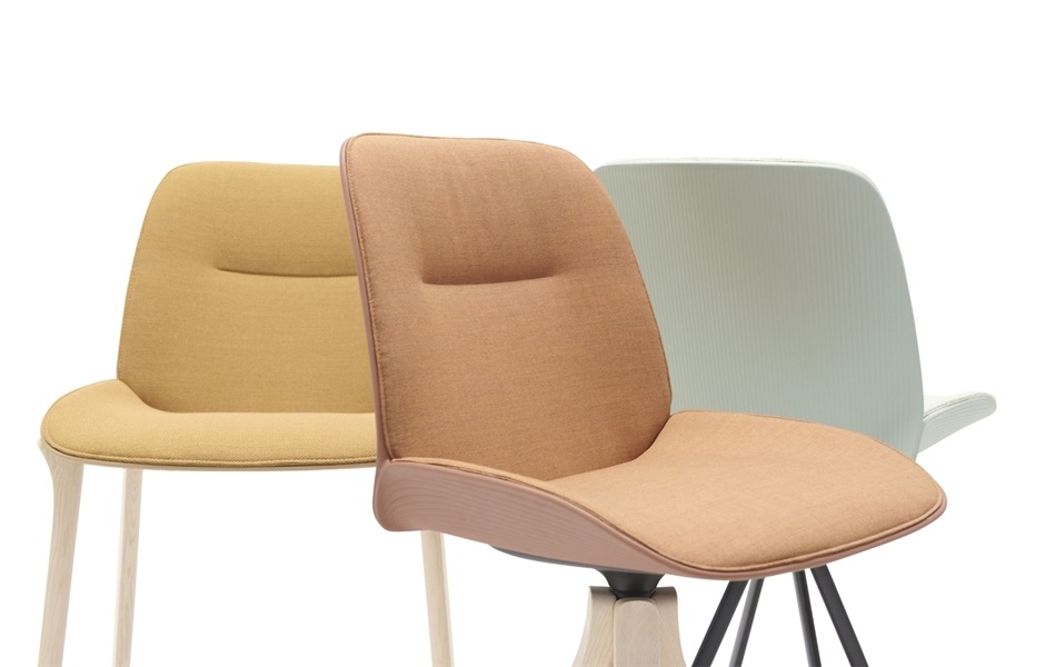 Andreu World Nuez Chair close-up of backrests of three chairs  in different colors 