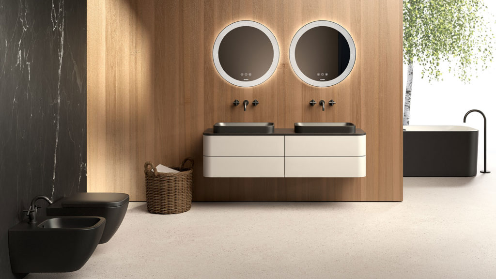 Happy D Happy D.2 Plus matte black above-counter sink on white console with white circular mirrors and black toilet and bidet