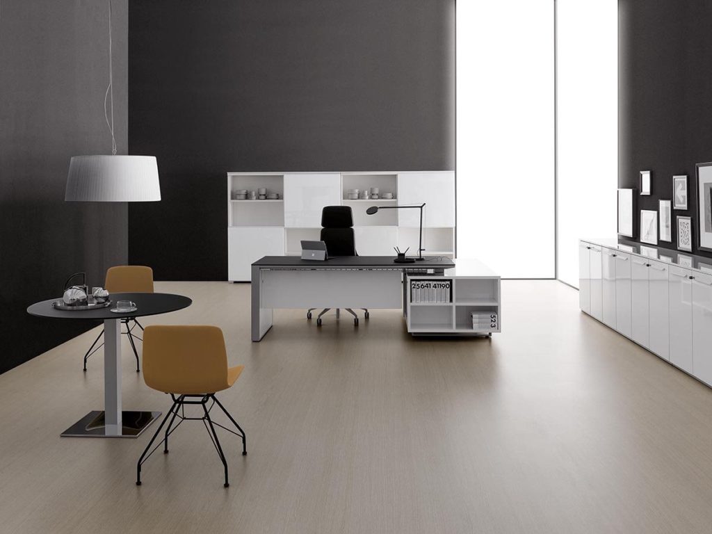 DVO Executive Office Planeta with desk, storage, credenza, cafe table, and chairs in dark tones, white, and taupe