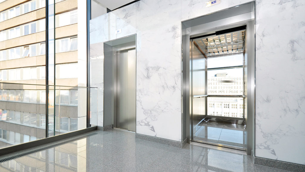 3M's DI-NOC collection renovation of elevator exterior in marble
