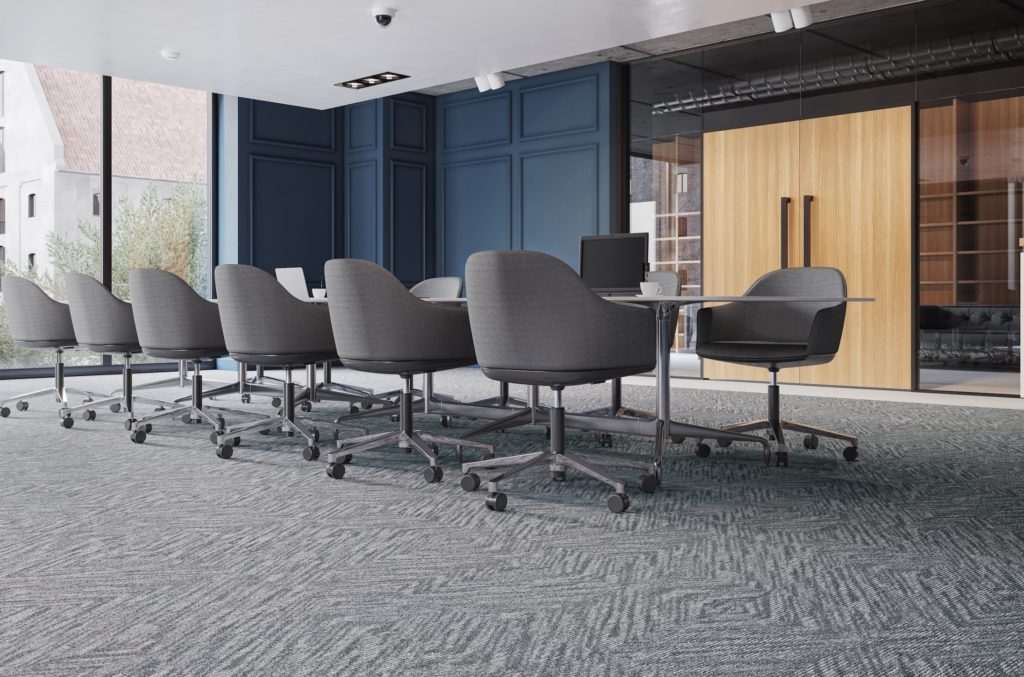 Tarkett Vellum and Bindery dark gray and light gray beneath conference table with many chairs