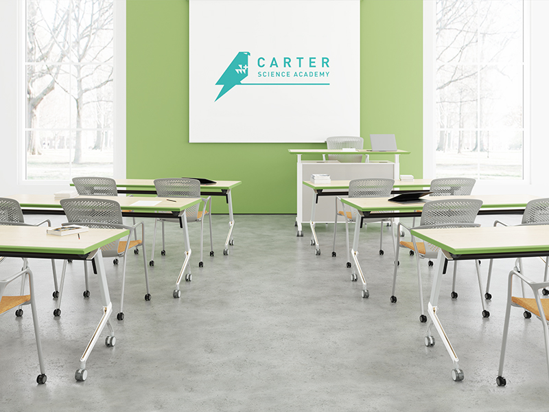 Dax Training Tables in classroom many rectangular tables with white tops and green edge