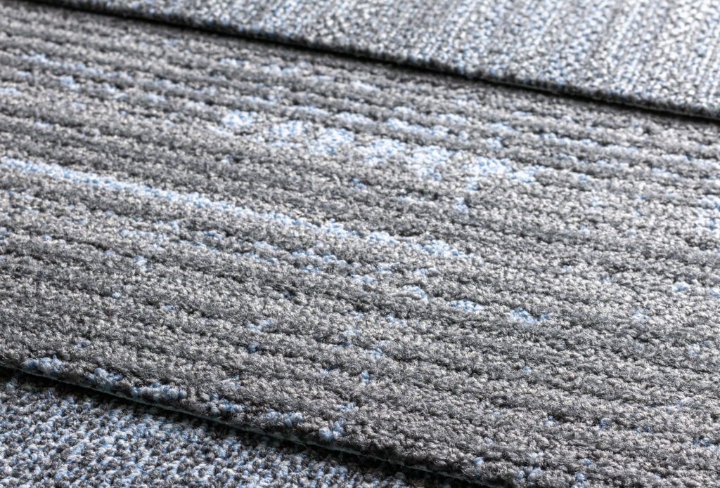 Tarkett Light Shift Collection detail of three carpet styles