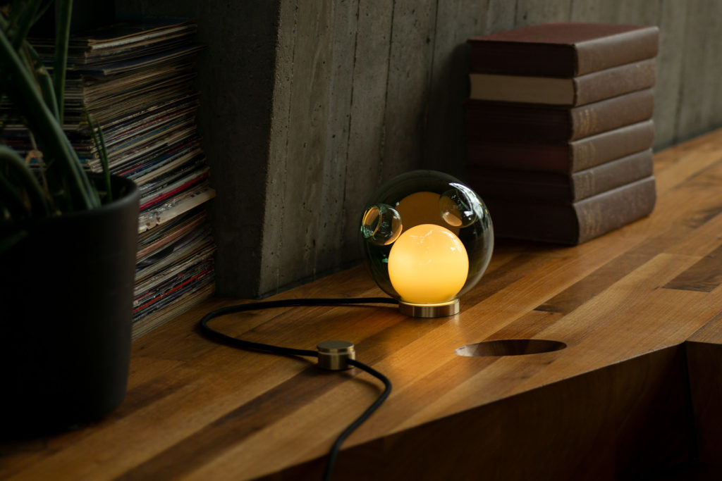 Bocci 28 Table Lamp smoke on desk with books