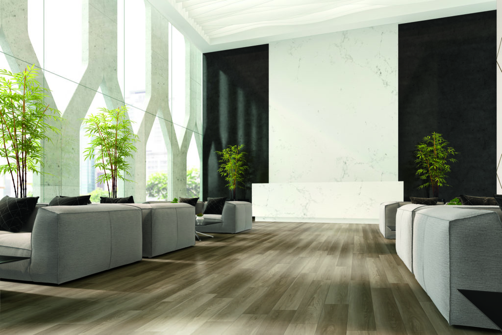 Product Intelligence resilient vinyl flooring by Armstrong flooring wood grain floor with light gray lounge furniture and white marble reception desk
