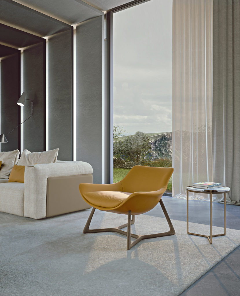 Lyra chair by turri in mustard in spacious room near white sofa with view out window of natural rock formation