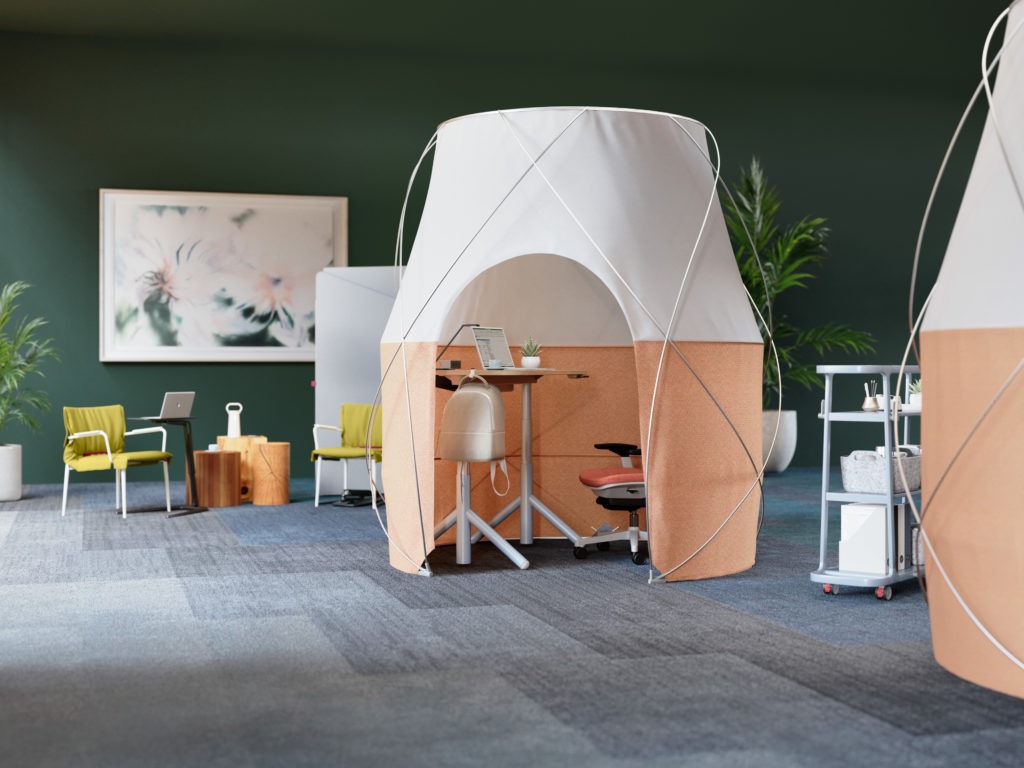 Steelcase Work Tent white and peach in room with chair, small table, and painting 