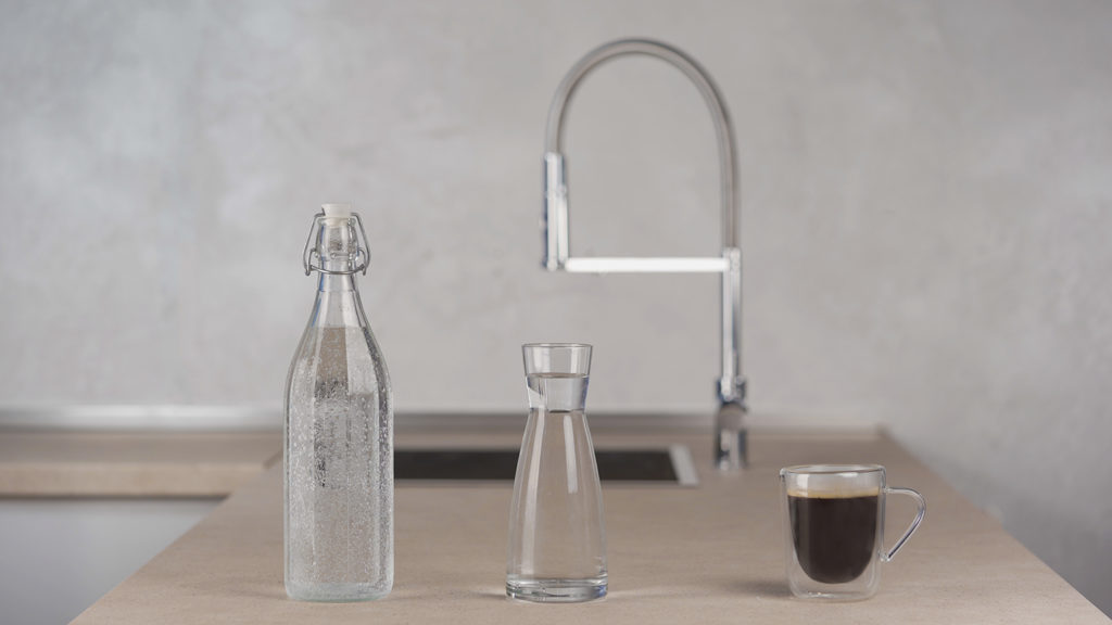 Tuttono faucet with carafe of sparkling, carafe of still, and shot of espresso