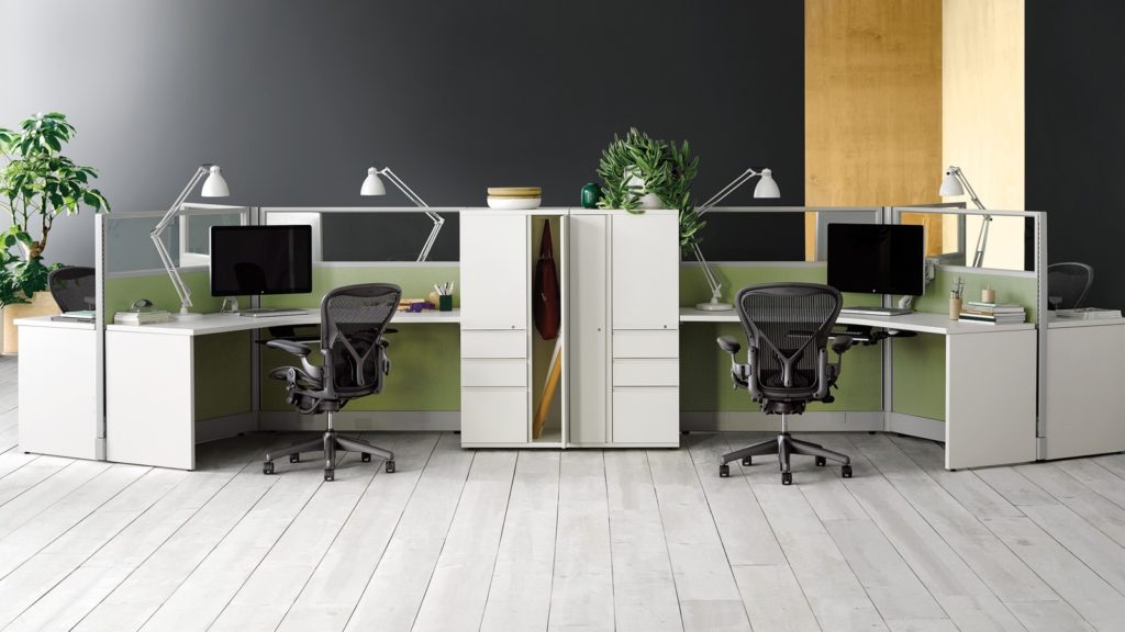 Action Office with green base color and Aeron Chairs