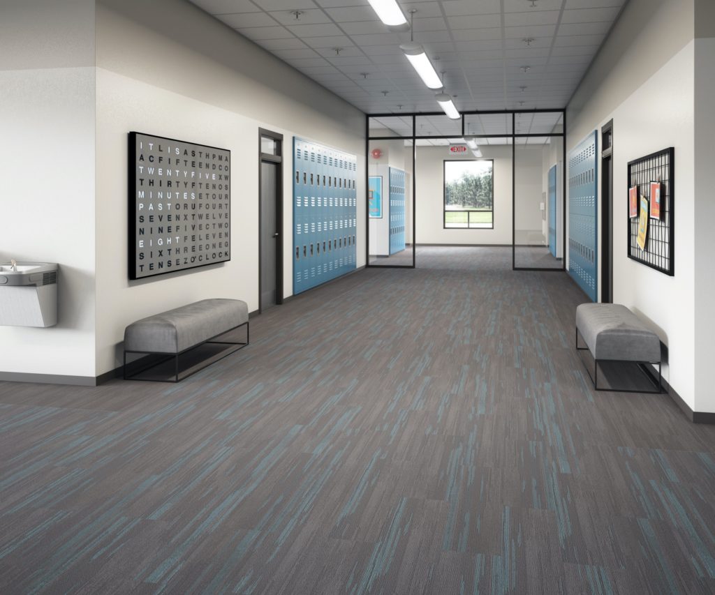 AVA STRM LVT brown and blue linear pattern in school hallway
