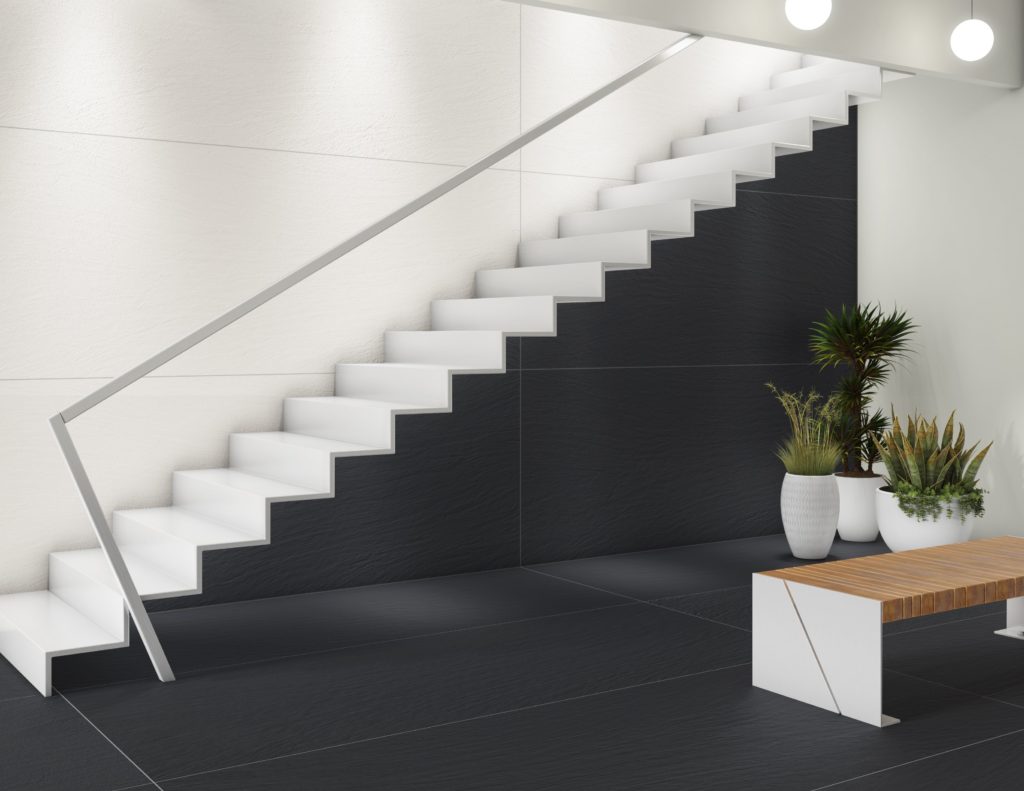 Ardesia a Spacco Nero on staircase wall and floor in basement room