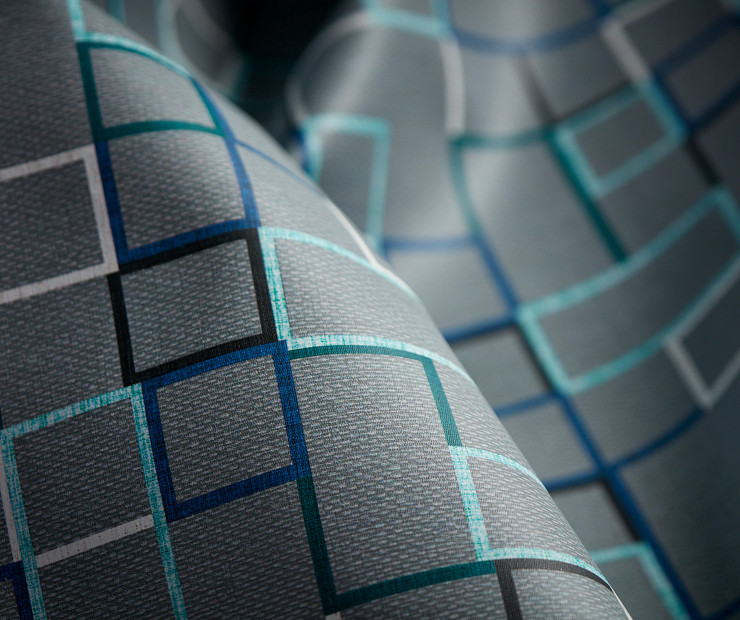 Techne Collection Edge textile detail of overlapping squares in different colors on gray background