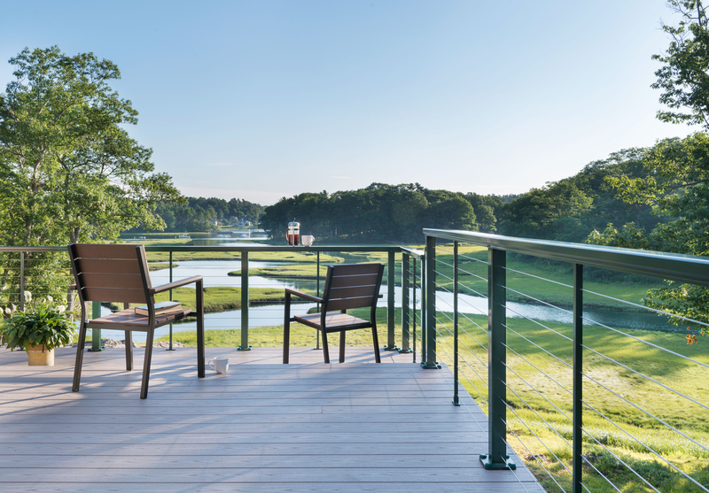 Feeney ColorEasy green railing on deck wiht view of field with lagoons and forest