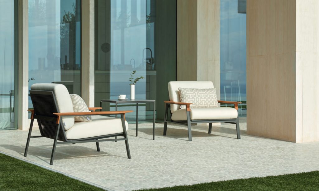 Point City Collection two armchairs with white upholstery on terrace