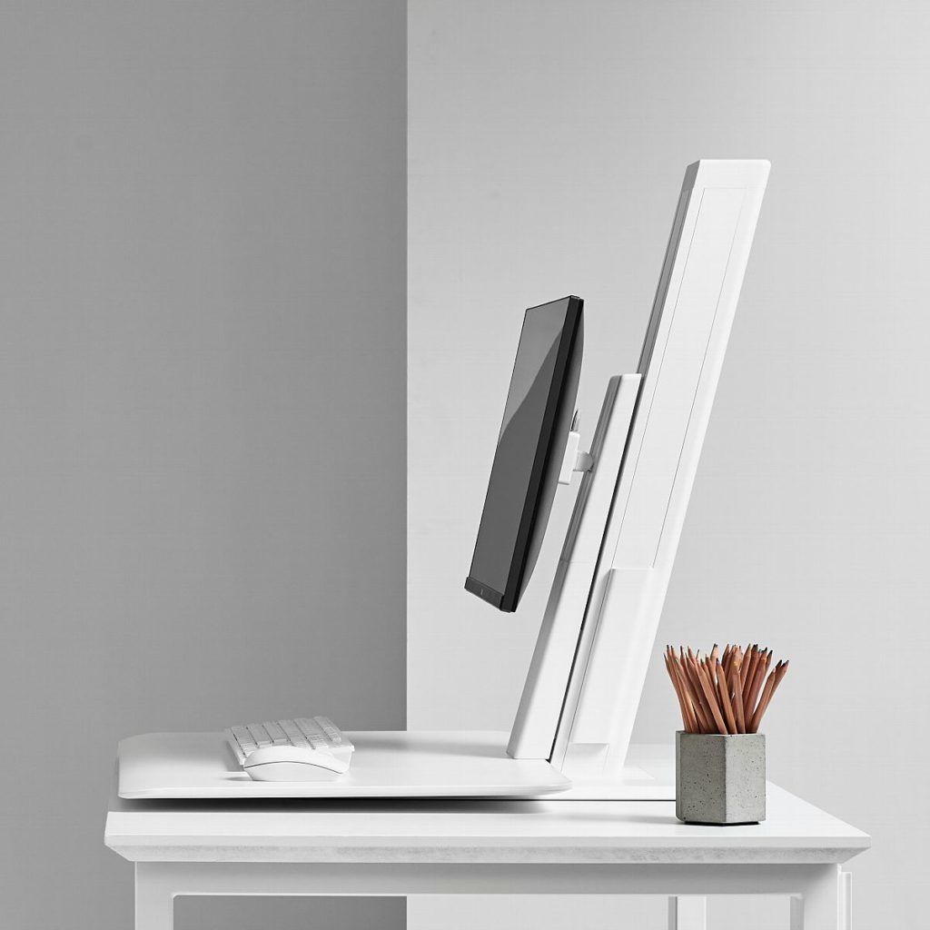 QuickStand Eco with monitor side view with desk with pencil jar