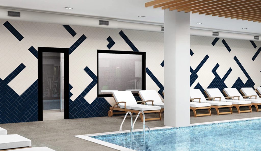 SpecStars Daltile Color Wheel on wall of indoor pool 