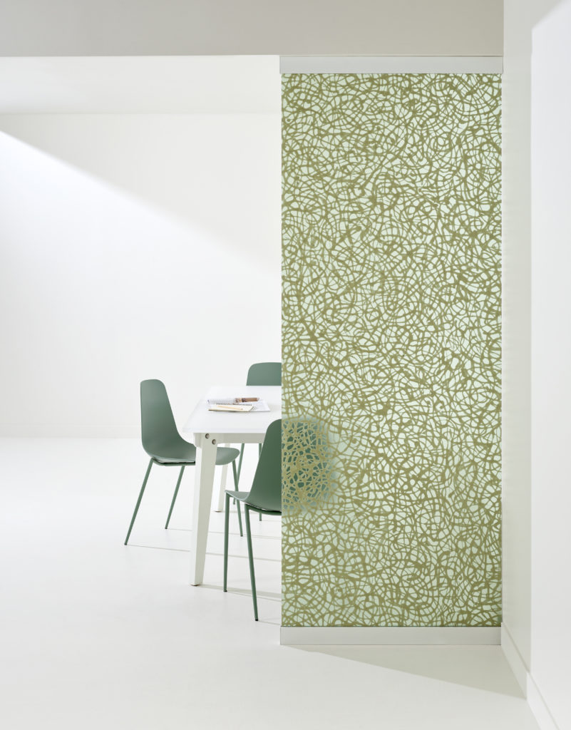 Tall Tulsi panel in Pistachio with table and chairs beyond