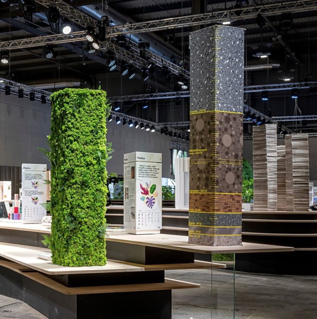 Natural design materials in displays with informational signage