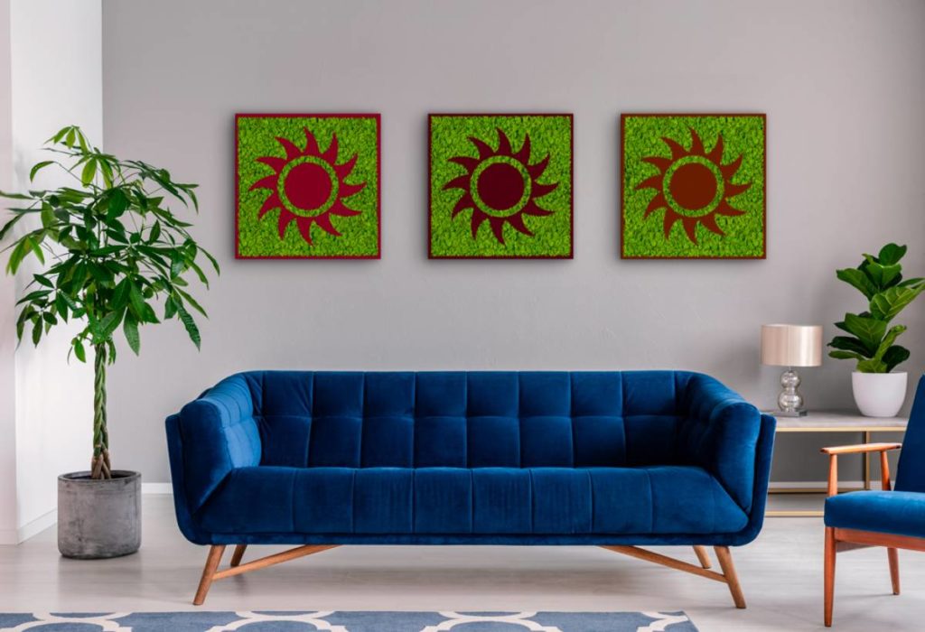 picture-sized panels in green with red sun above blue sofa