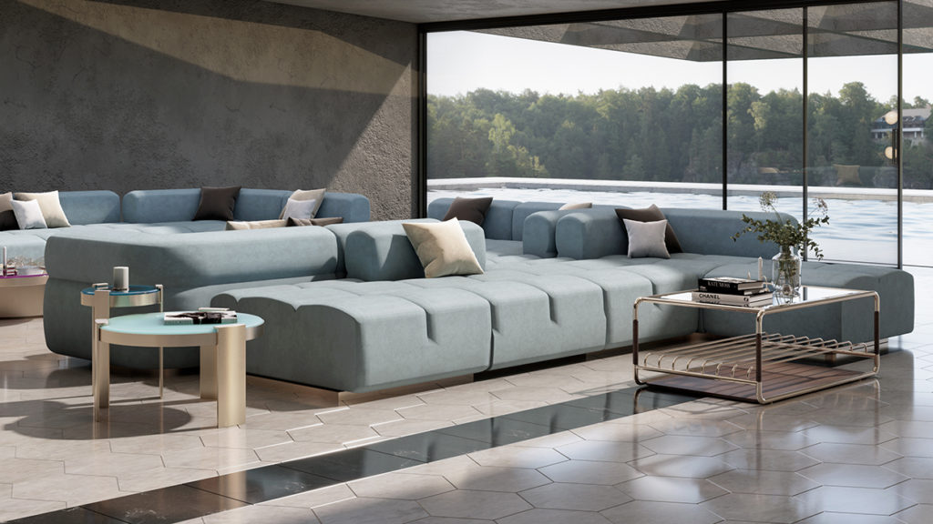 Qube sofa in blue expansive arrangement with many elements in large room with floor-to-ceiling window looking out on swimming pool