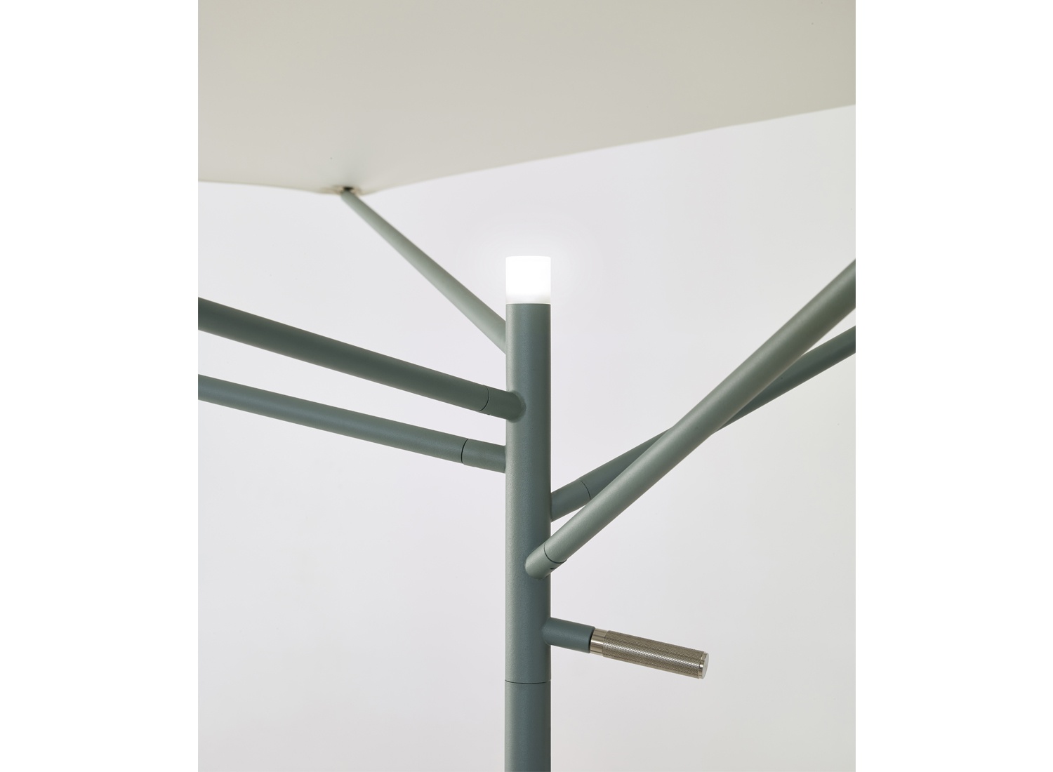 detailed view of LED light integrated into parasol frame