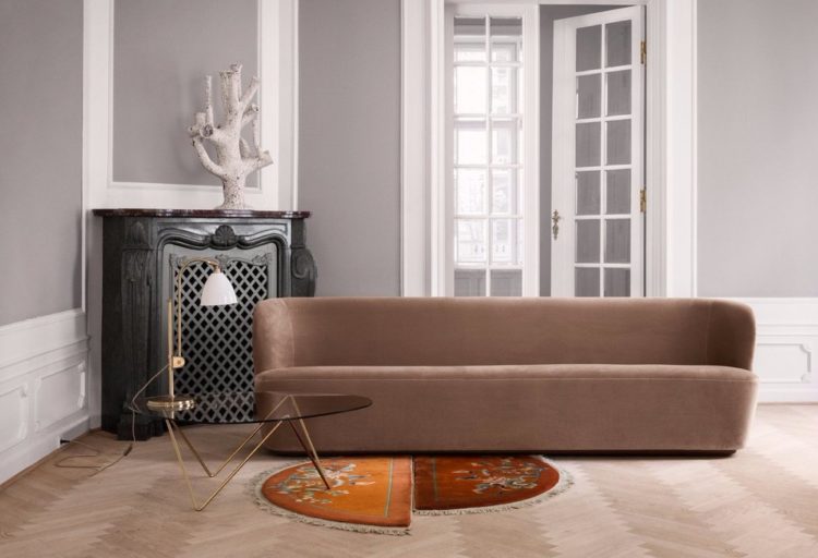 sinuous upholstered sofa in designer living room