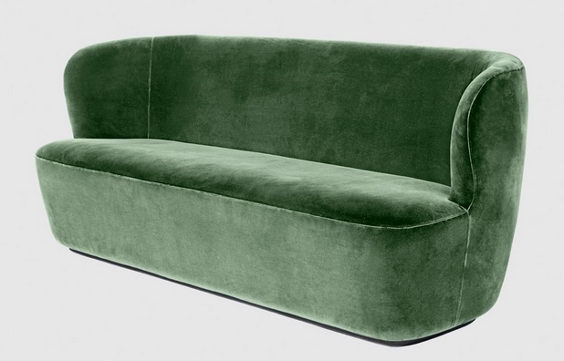 curvy sofa in green velvet