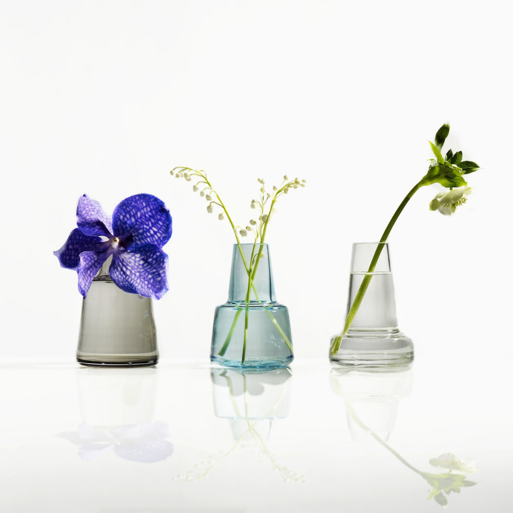 three simple handblown glass vases