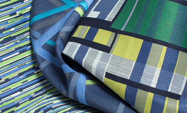 detail of three geometric fabrics in blues