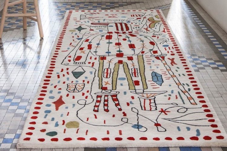 colorful wool rug with hand-drawn shapes and creatures