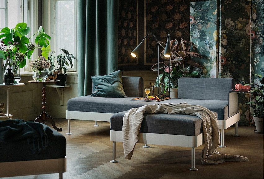 Tom Dixon Delaktig Bed for Ikea with blue cushions in living/bedroom