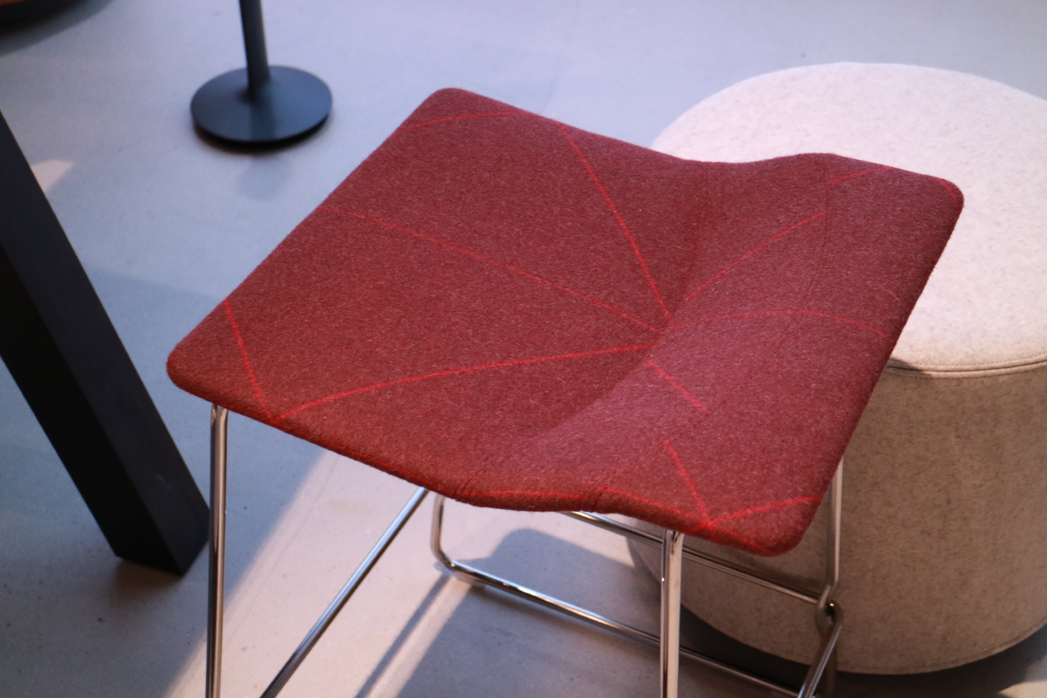 Designtex and Coalesse new textile collection on Coalesse chair in red