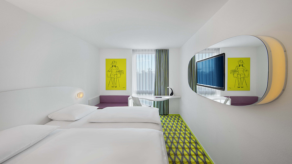 hotel room with neon green carpet and white walls