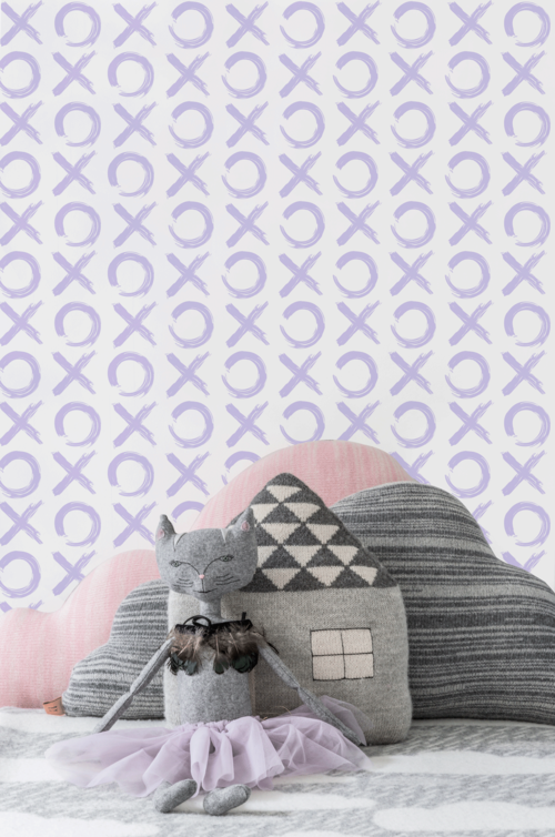 kids room detail with lavender wallpaper and gray cat toy