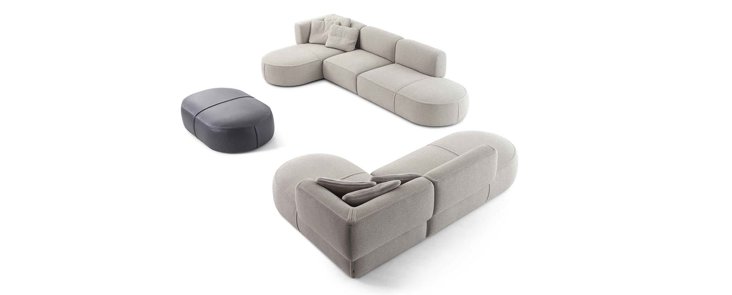 two modern upholstered ground sofa with pill-shaped ottoman against white background