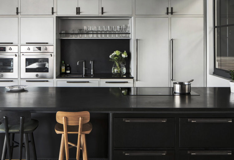 modern black kitchen with Buster + Punch Hardware