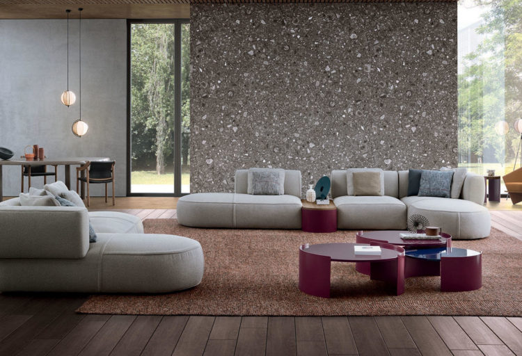 large modern living room with curvy uplholstered modular sofa