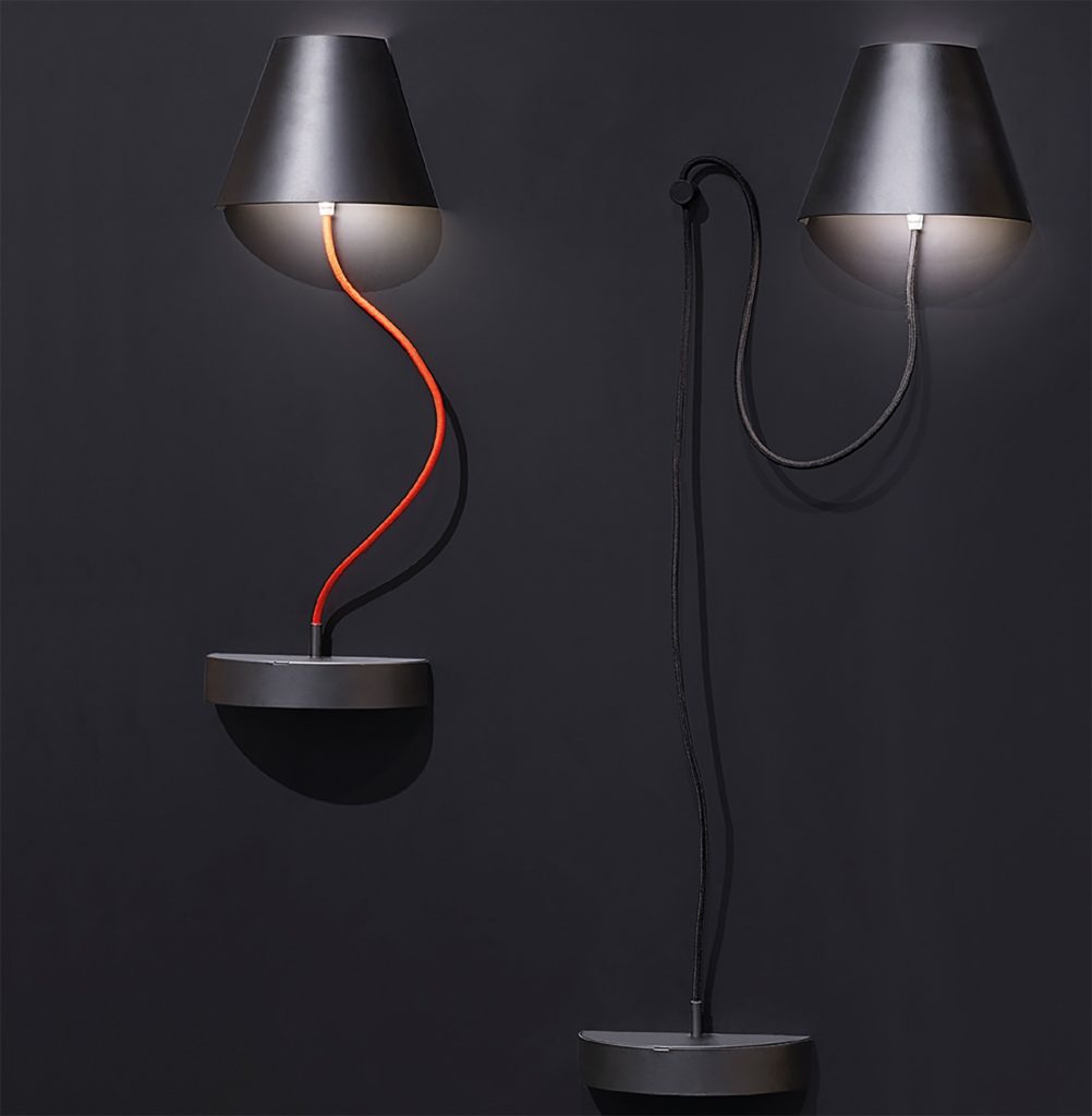 Ronda Design Lapilla Magnetic Lamp two lamps on black wall