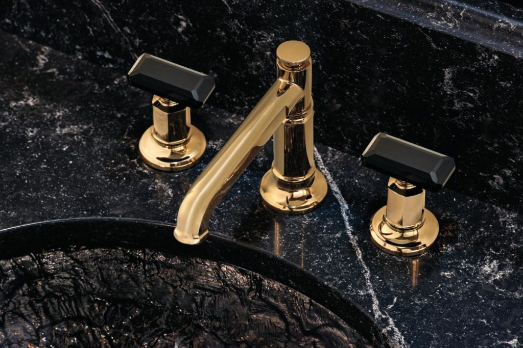 Brizo Invari Bath Collection on black vanity with black crystal knobs