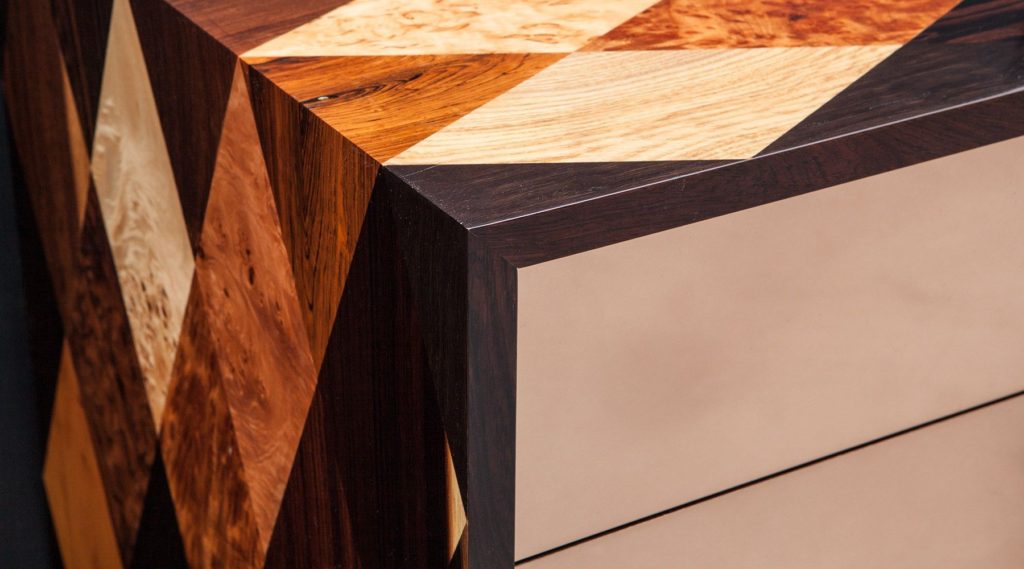detail view of diamond pattern on wood veneer sideboard