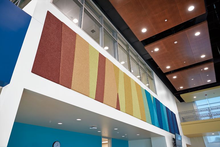 Armstrong Tectum panels ceiling and wall panels in high school