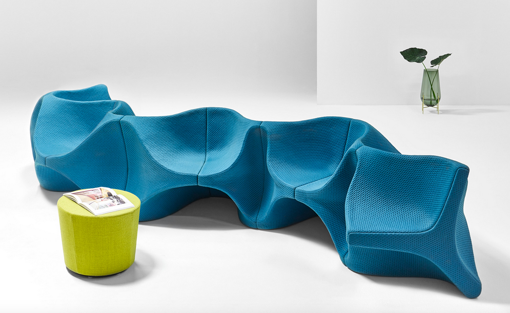 aqua upholstered lounge modular seating with sinuous convex shapes